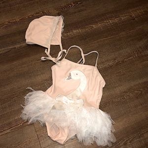 Light pink white swan one piece swimsuit with tulle skirt and matching swim cap